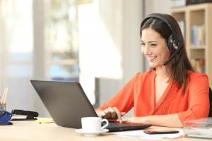 A-woman-wearing-a-phone-headset-working-on-a-call
